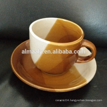 stoneware color glazed cup and saucer